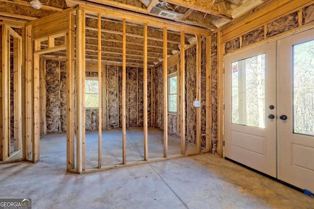 misc room with a wealth of natural light and french doors