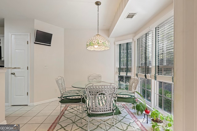 dining room featuring light tile patterned floors