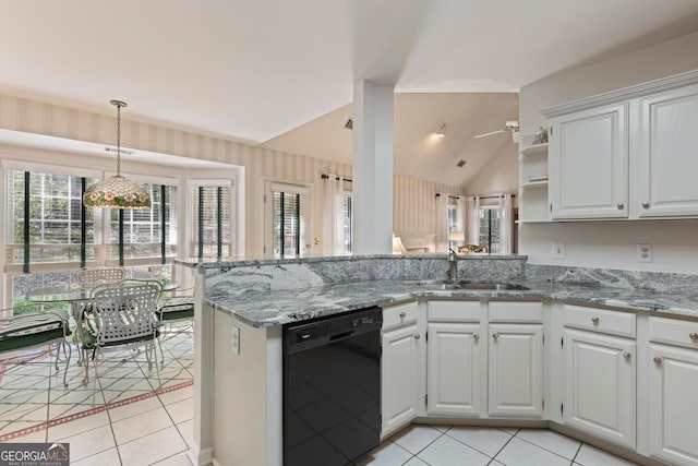 kitchen featuring black dishwasher, vaulted ceiling, white cabinets, and kitchen peninsula