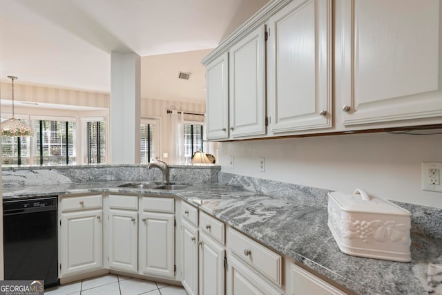 kitchen with sink, a healthy amount of sunlight, dishwasher, and white cabinets