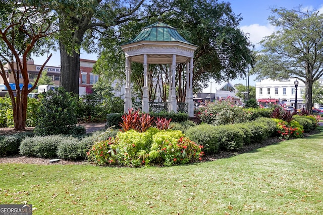 exterior space featuring a gazebo and a yard