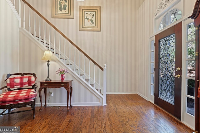 foyer entrance with hardwood / wood-style flooring