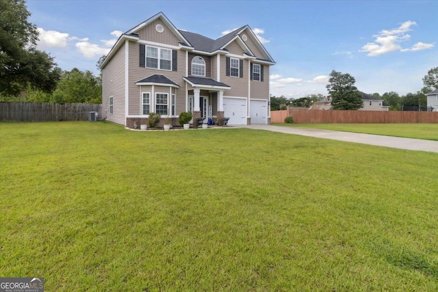 view of front of property featuring a garage, central air condition unit, and a front yard