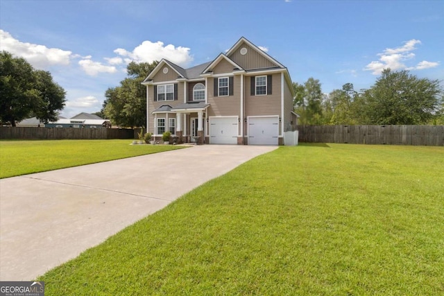 view of front of house featuring a garage and a front yard