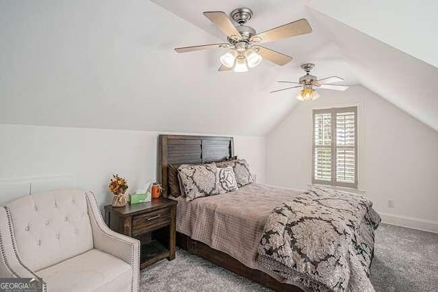 bedroom featuring ceiling fan, lofted ceiling, and light carpet