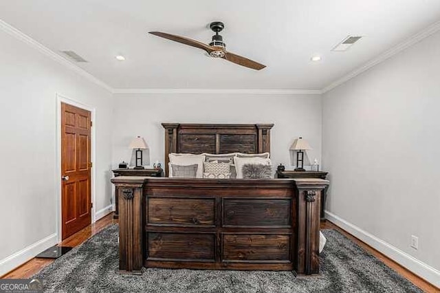 bedroom featuring wood-type flooring, ceiling fan, and ornamental molding