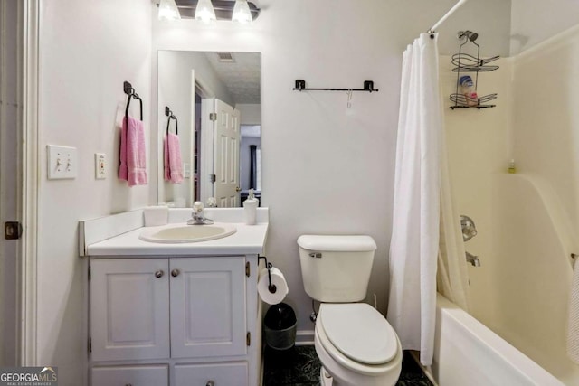 full bathroom with shower / bath combo, visible vents, vanity, and toilet