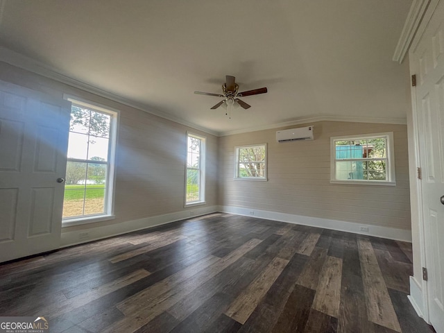 empty room with crown molding, ceiling fan, dark hardwood / wood-style flooring, and an AC wall unit