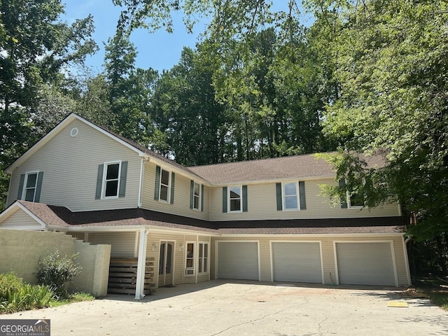 view of front of property with a garage