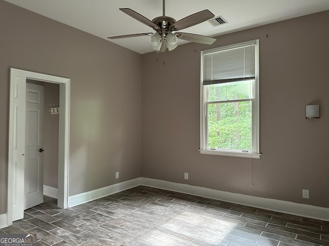 unfurnished room featuring ceiling fan