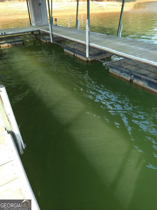 view of dock featuring a water view