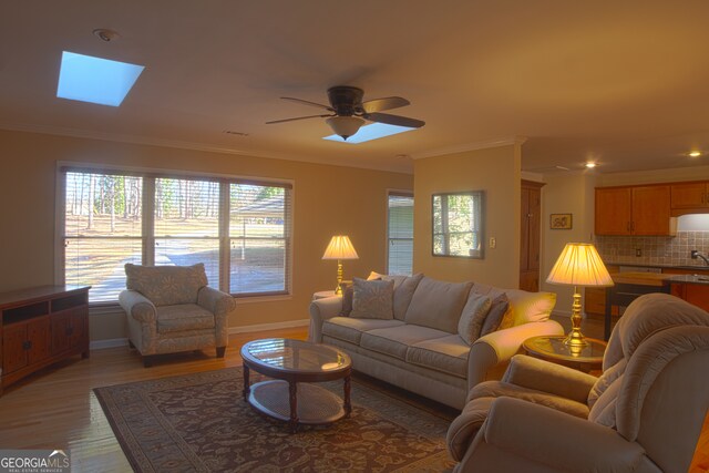 manufactured / mobile home featuring a sunroom and a front lawn