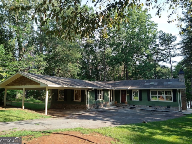 ranch-style home featuring a chimney, aphalt driveway, crawl space, and a front yard