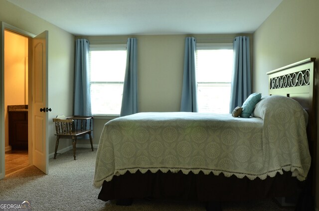 bedroom featuring carpet flooring