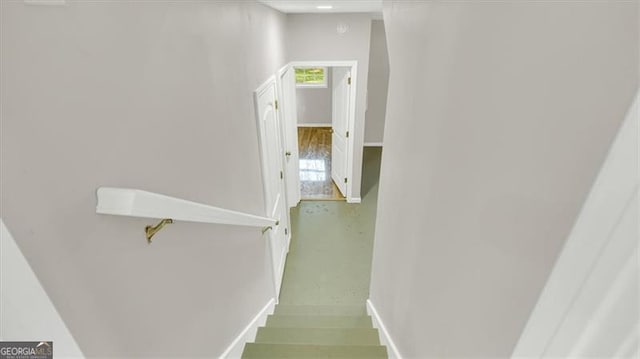 stairs featuring a wealth of natural light