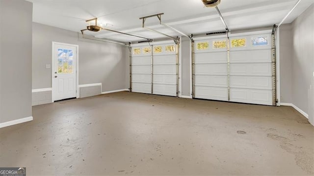 garage featuring a garage door opener