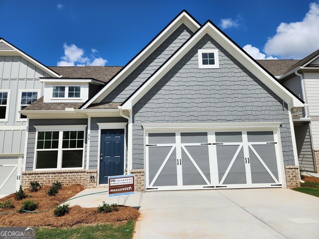 craftsman inspired home featuring a garage