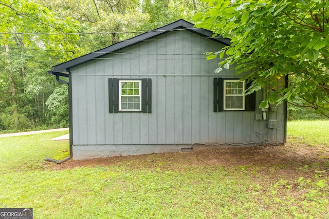view of home's exterior featuring crawl space and a lawn