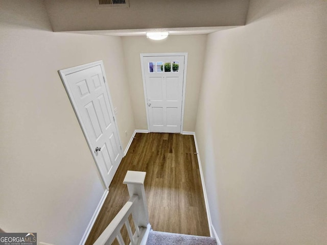 entryway with wood-type flooring