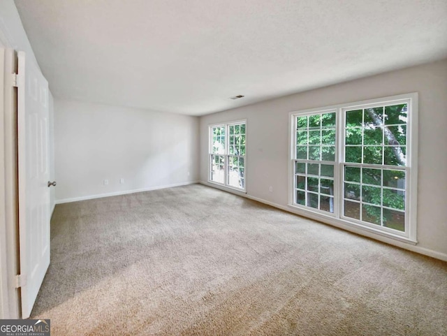 view of carpeted spare room