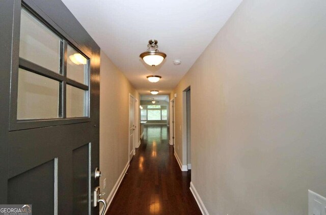 hall featuring dark hardwood / wood-style floors