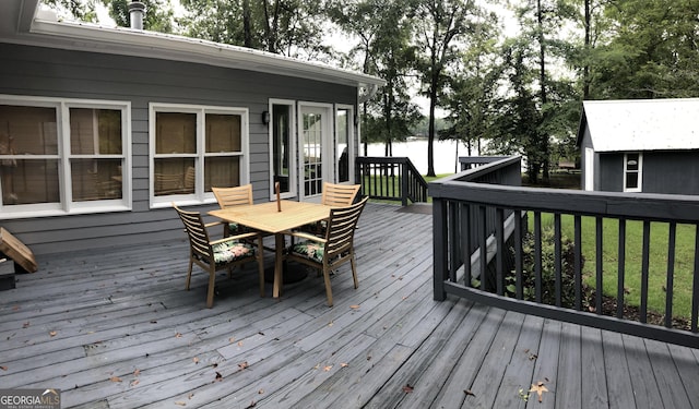 deck featuring an outdoor structure