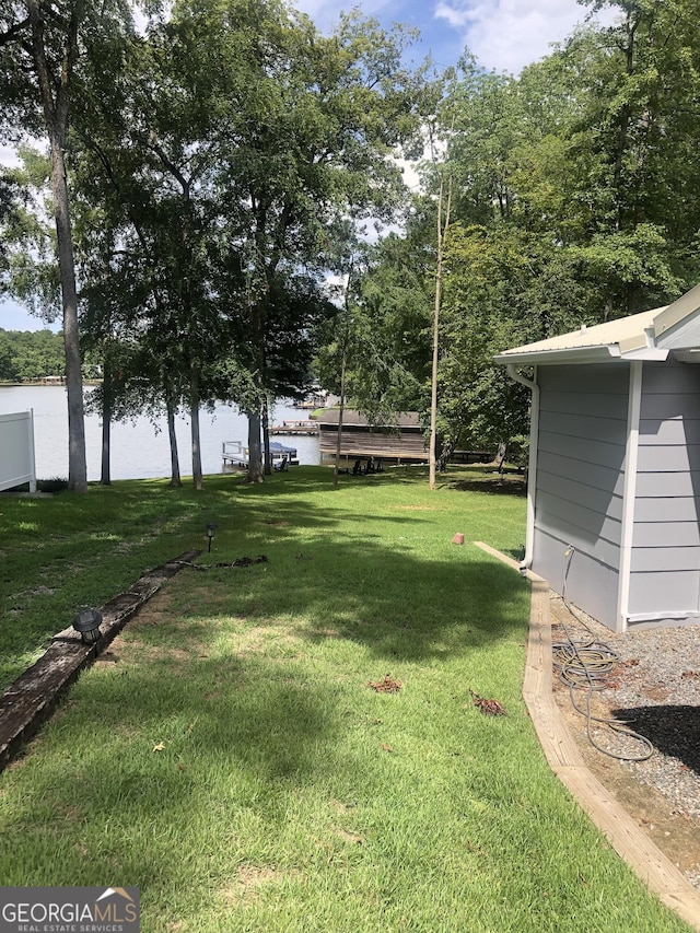 view of yard with a water view