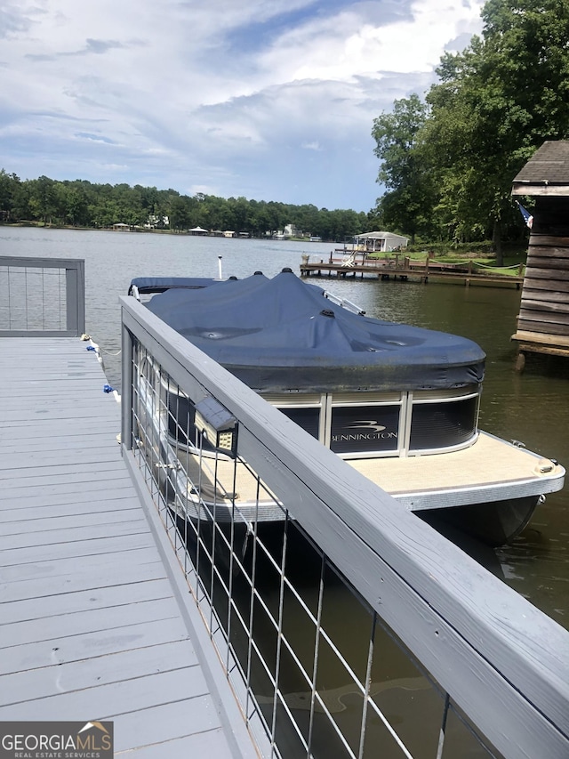 view of dock featuring a water view