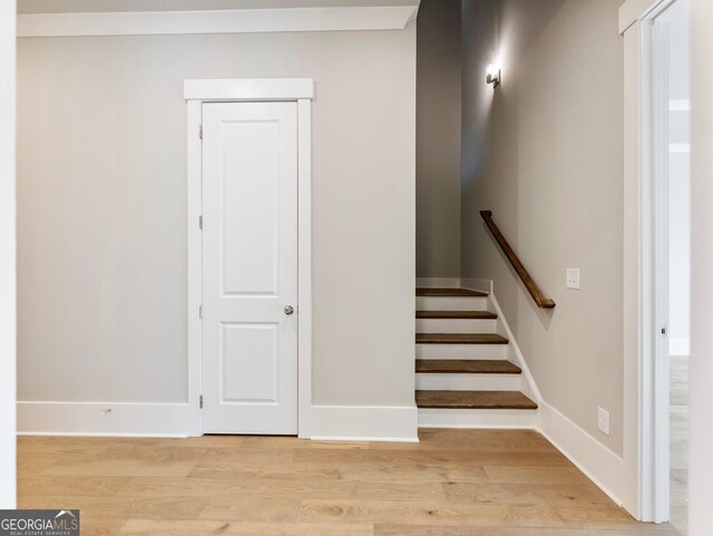 stairway with wood-type flooring