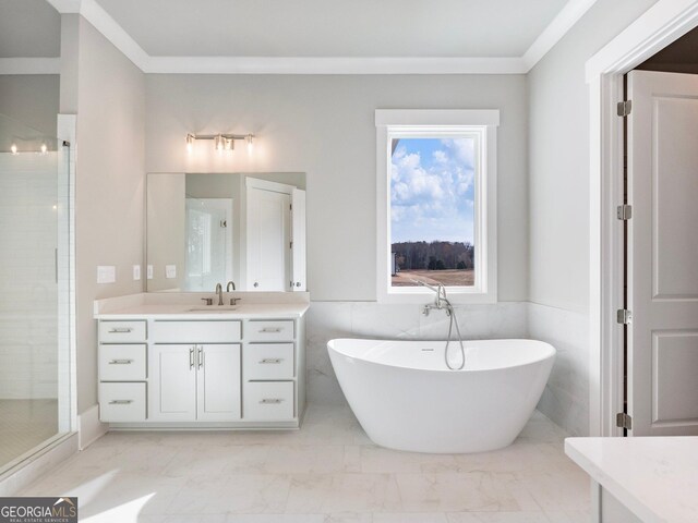 bathroom featuring vanity, separate shower and tub, crown molding, and tile walls