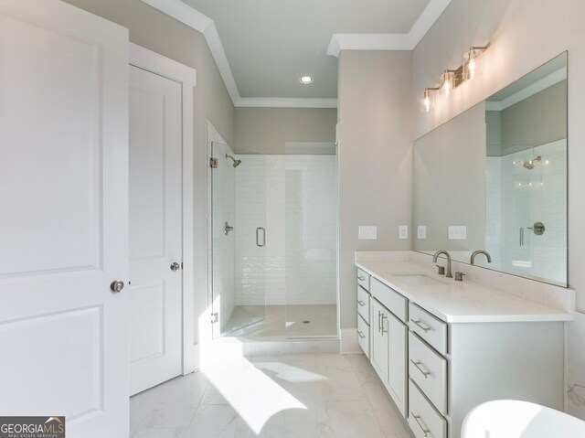 bathroom featuring crown molding, a shower with door, and vanity