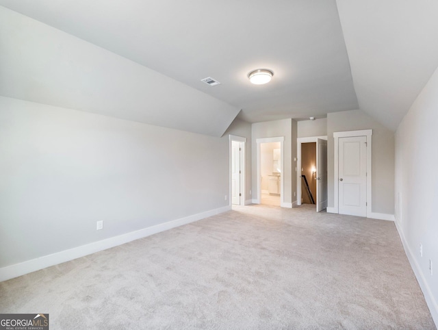216 Ewing Way, Dacula, GA 30019 - additional living space with light colored carpet and lofted ceiling