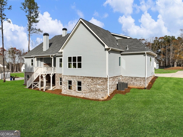 216 Ewing Way, Dacula, GA 30019 - rear view of property with a chimney, stairs, a yard, and roof with shingles