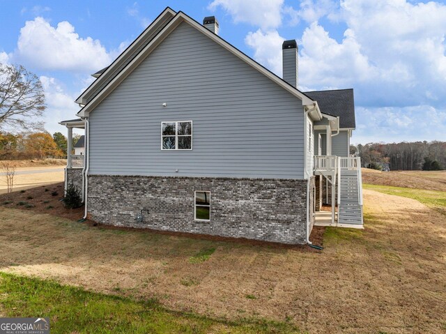 view of property exterior featuring a yard