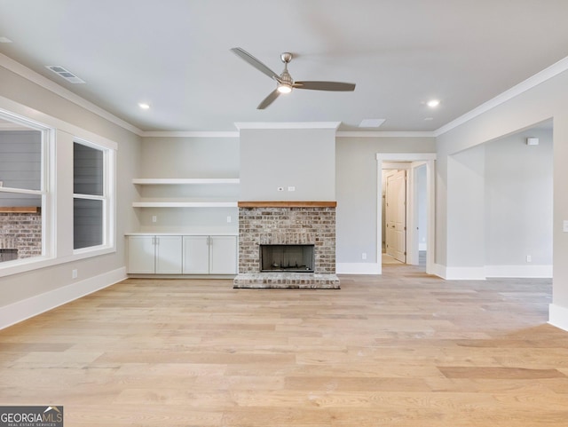 216 Ewing Way, Dacula, GA 30019 - unfurnished living room featuring ornamental molding, ceiling fan, a fireplace, light wood-style flooring, and recessed lighting