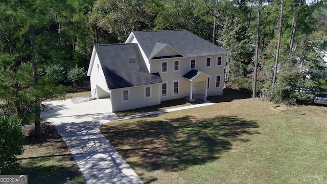 view of front of home with a front lawn