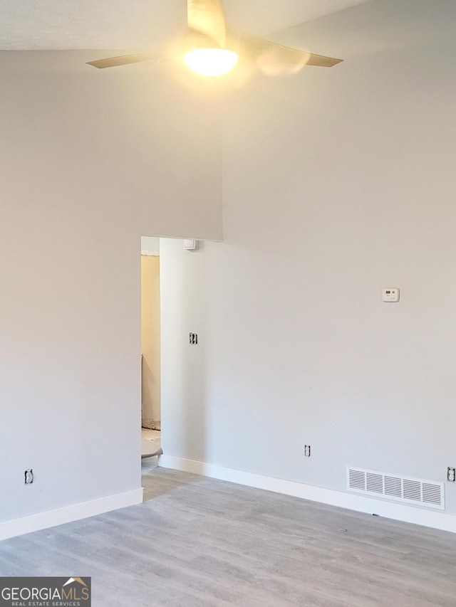 spare room with light hardwood / wood-style floors