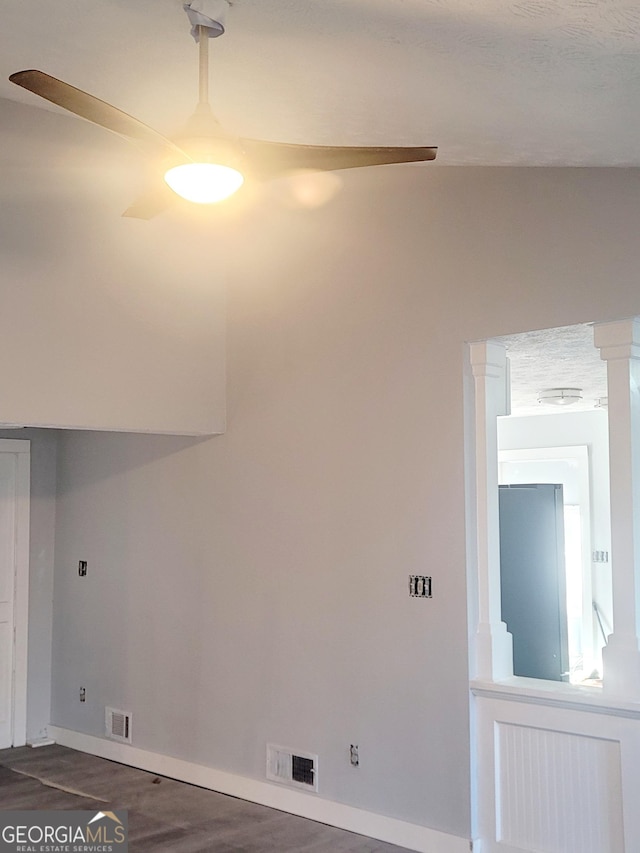 clothes washing area with dark hardwood / wood-style floors