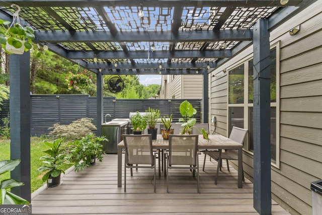 view of patio with a pergola, area for grilling, and a fire pit