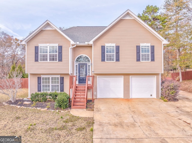 bi-level home featuring a garage