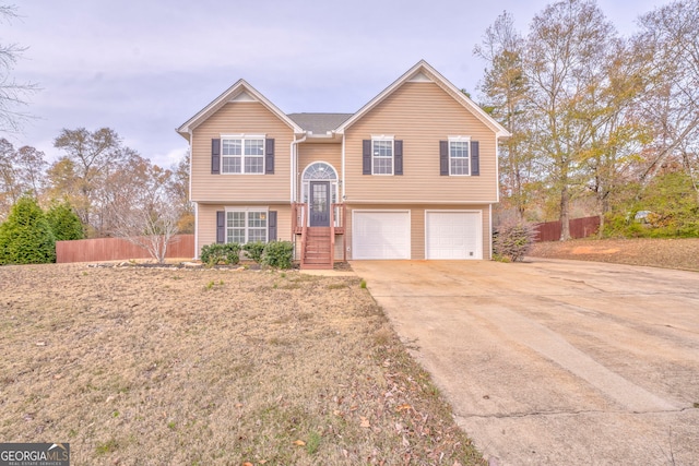 bi-level home featuring a garage