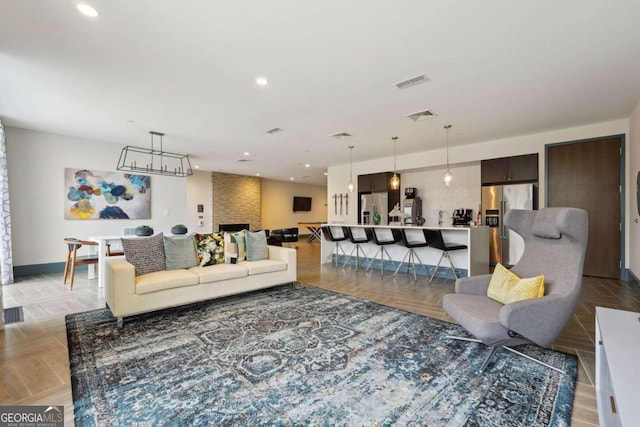 living room featuring light parquet flooring