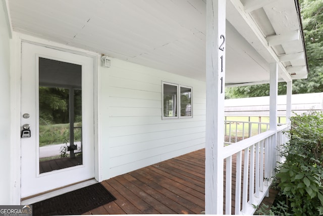 entrance to property with a deck