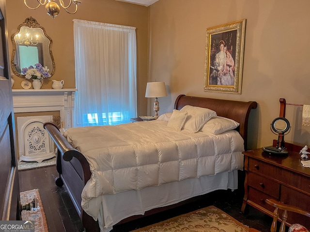 bedroom featuring dark hardwood / wood-style flooring