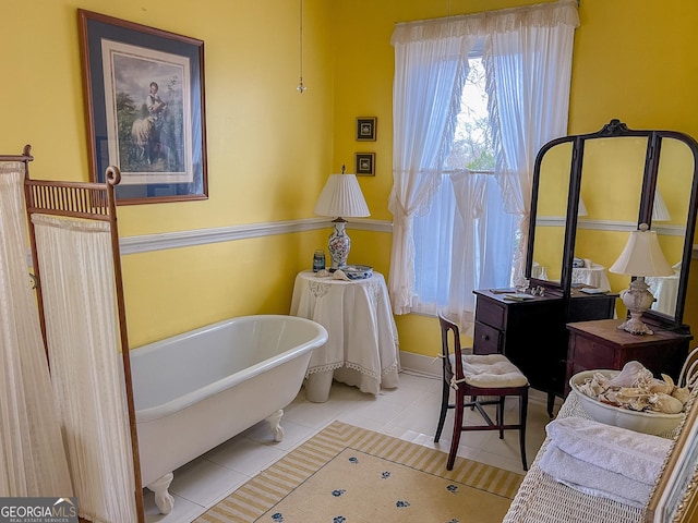 bathroom featuring tile patterned flooring and a bathing tub