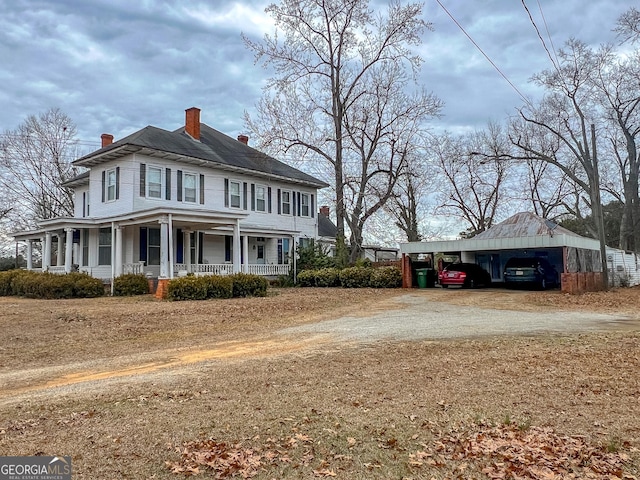 view of front of property featuring covered porch