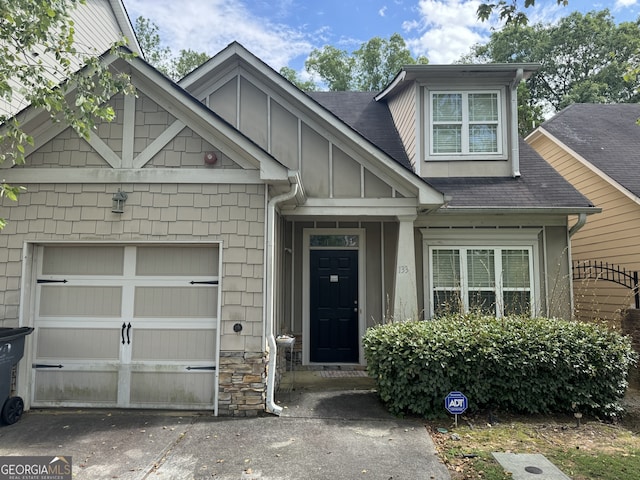 doorway to property featuring a garage