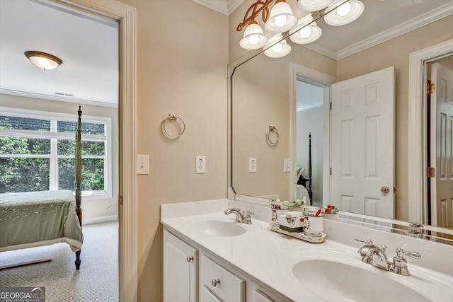 bathroom featuring crown molding and dual bowl vanity