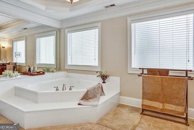 bathroom featuring tile patterned flooring, a tub, crown molding, and a tray ceiling