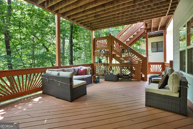 deck featuring an outdoor living space